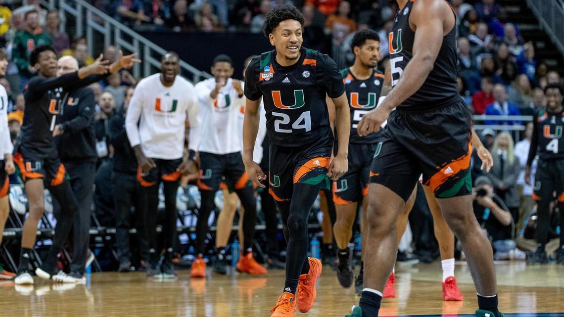 Miami guard Nijel Pack (24) celebrates a 3-pointer against Houston during a Sweet 16 college basketball game in the Midwest Regional of the NCAA Tournament Friday, March 24, 2023, in Kansas City.