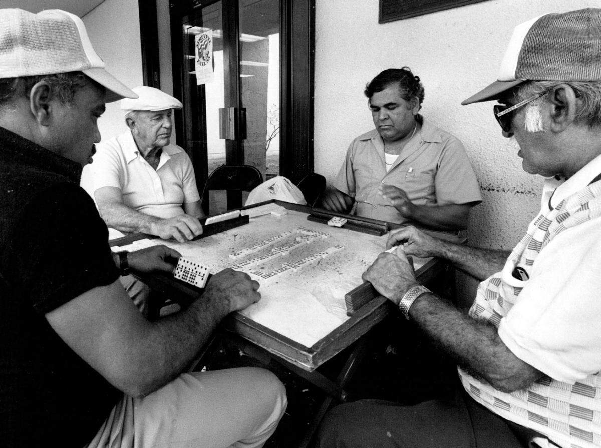 In 1988, residents of the Wynwood neighborhood pass the time playing dominoes at Eugenio Maria De Hostos Neighborhood Center on Northwest Second Avenue and 30th Street.