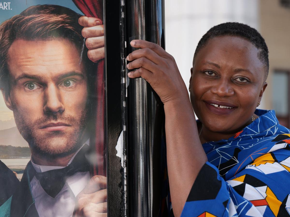 April Dobbins, the new director of programming for the Coral Gables Art Cinema, outside the theater on Wednesday, Sept. 29, 2021.