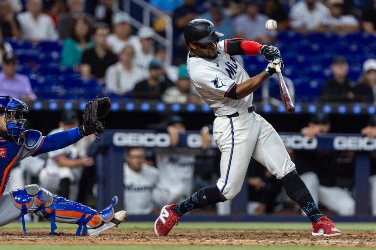 Miami Marlins batter Otto Lopez (6) swings at a pitch during the seventh inning of an MLB game against the New York Mets at loanDepot park on Wednesday, April 2, 2025, in Miami, Fla.