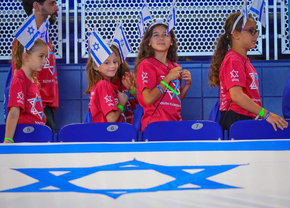 Bengalma Charter School Hollywood students walk to their seats as the South Florida community celebrated Israel’s 75th Independence Day on Wednesday, April 26, 2023. Over 6,000 convened at LoanDepot Park as they paraded into the ballpark and enjoyed musical performances, interactive games, and videos in Miami, Florida.