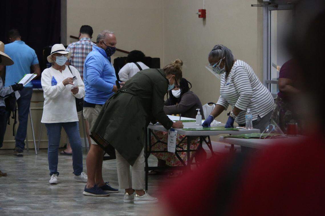 Approximately 50 voters waited in line during &nbsp;a brief flurry of activity as doors opened at 7 a.m. Tuesday, Nov. 3, 2020,  at the C . Lawton McCall Community Center in Miami Shores. They flowed in and right out again after casting their votes and by 7:37 a.m. there was no longer a line.