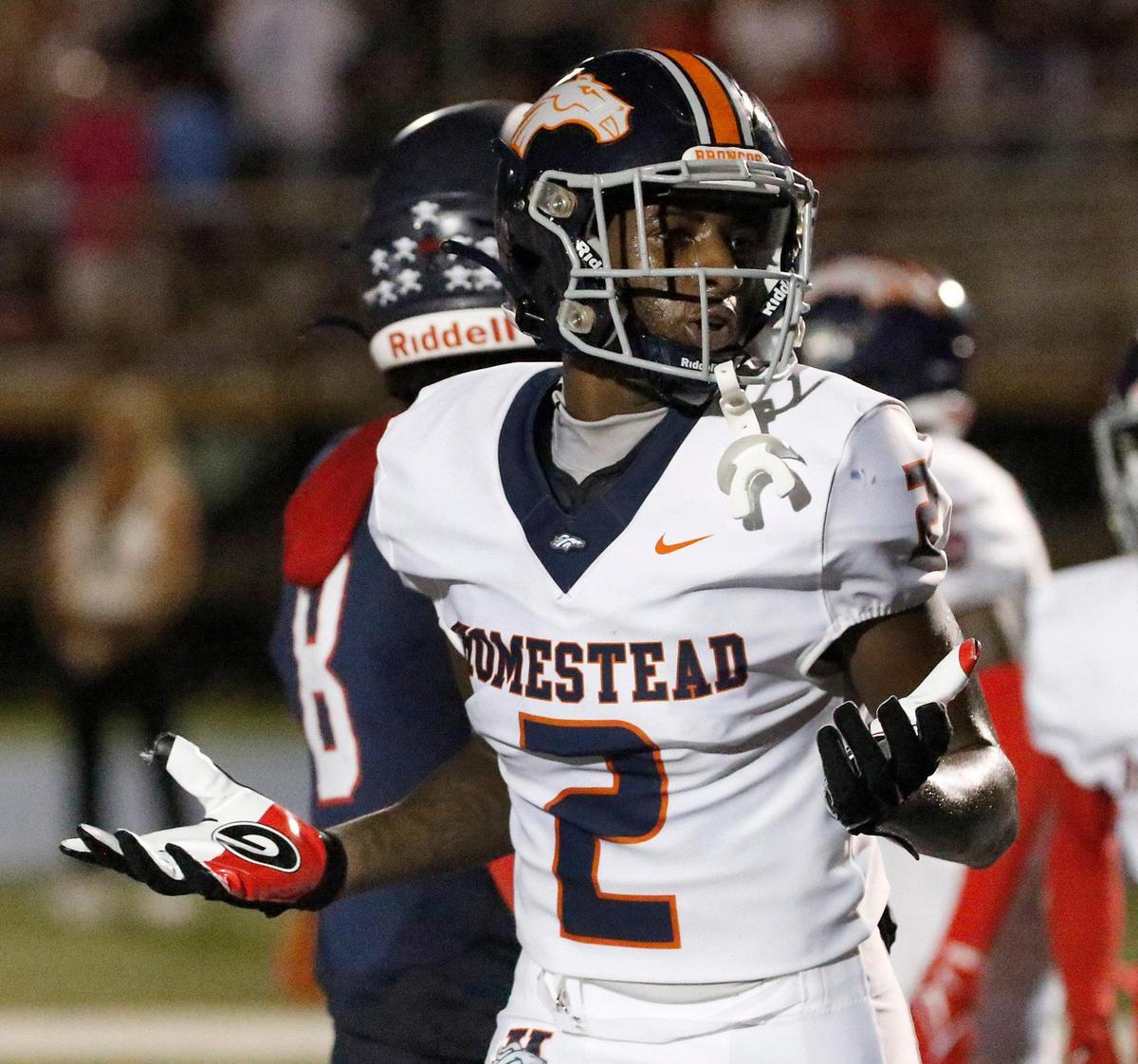 Homestead Broncos wide receiver Cortez Mills (2) walks after he scored a touchdown against Columbus Explorers during the football game on Saturday, October 07, 2023 at Tropical Park Stadium in Miami. Andrew Uloza / for Miami Herald