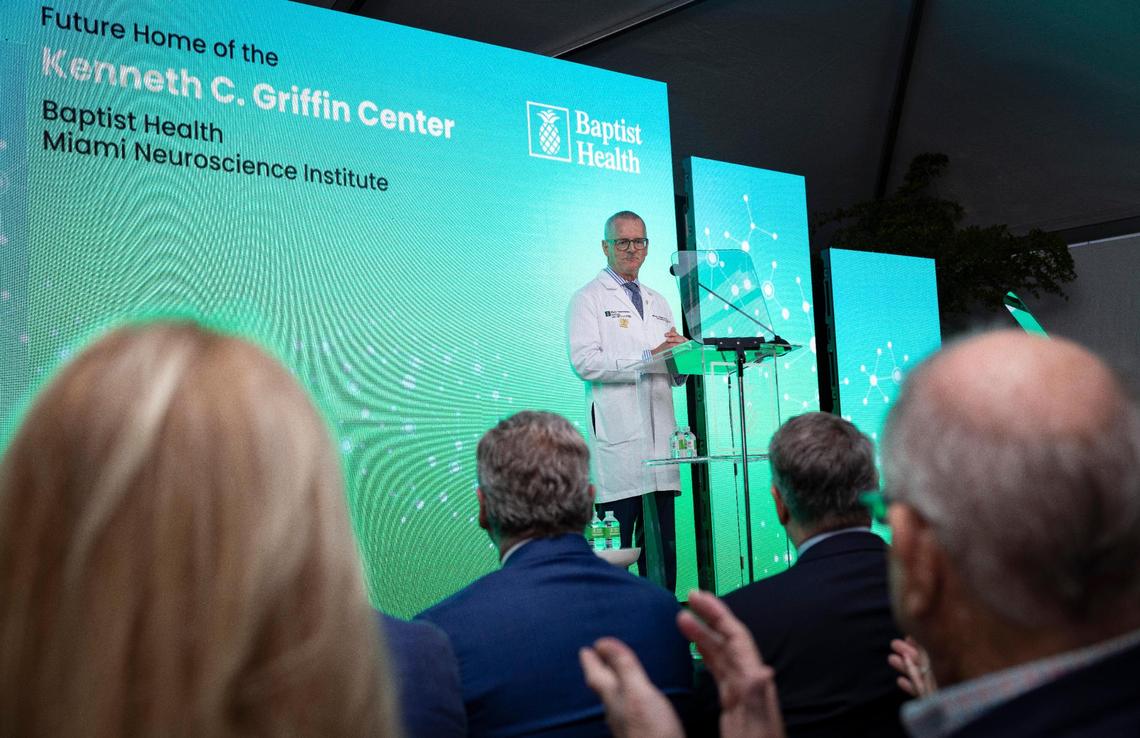 Dr. Michael McDermott, chief medical executive of the Miami Neuroscience Institute, thanks Ken Griffin, Citadel CEO, for his donation during a ceremony on Tuesday, March 19, 2024, at the Baptist Health Baptist Hospital in Miami, Fla. It will be the future home of the Kenneth C. Griffin Center.