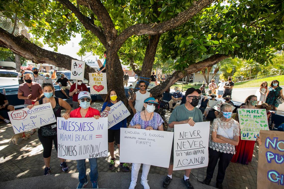 Miami Beach residents gather outside City Hall to protest the city’s handling of spring break on Saturday, March 27th, 2021.