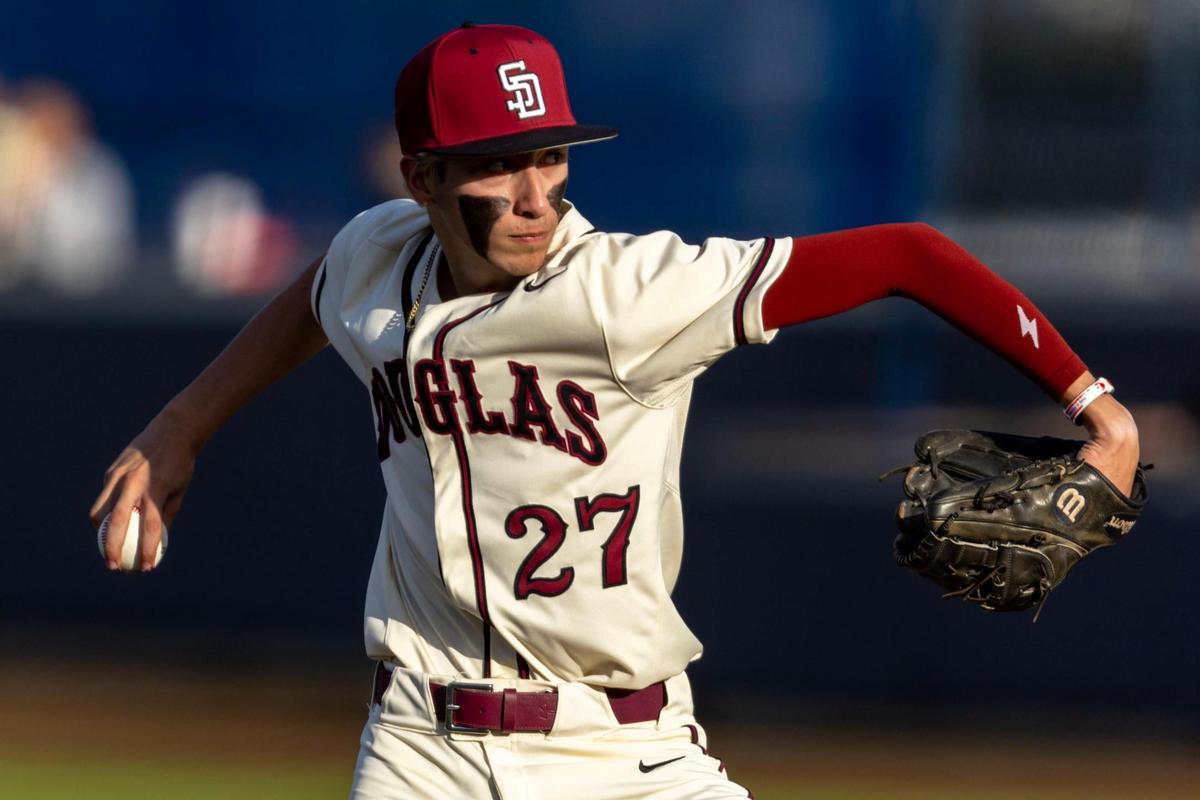 Marjory Stoneman Douglas pitcher Jayden Dubanewicz (27) throws the ball during the second inning of a high school baseball game against Columbus at Columbus High School in Miami, Florida, on Friday, March 24, 2023.