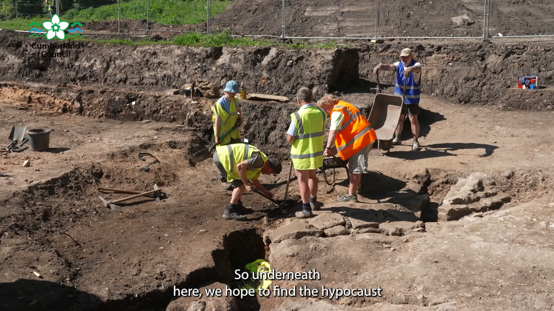 Archaeologists unearthed pair of “monumental” heads at Hadrian’s Wall ruins in Carlisle and called it “find of a lifetime,” photos show.