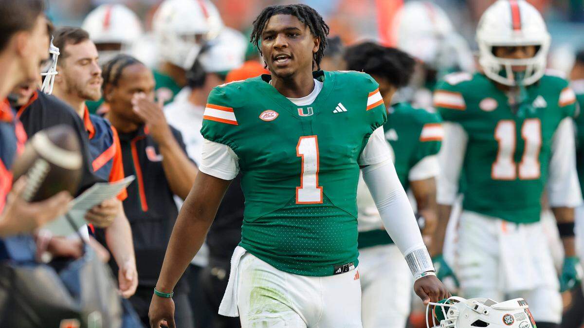 Miami Hurricanes quarterback Cam Ward (1) on the sidelines during the game against the Wake Forest Demon Deacons in the second half of their NCAA game in Miami Gardens, Florida, on Saturday, November 23, 2024.