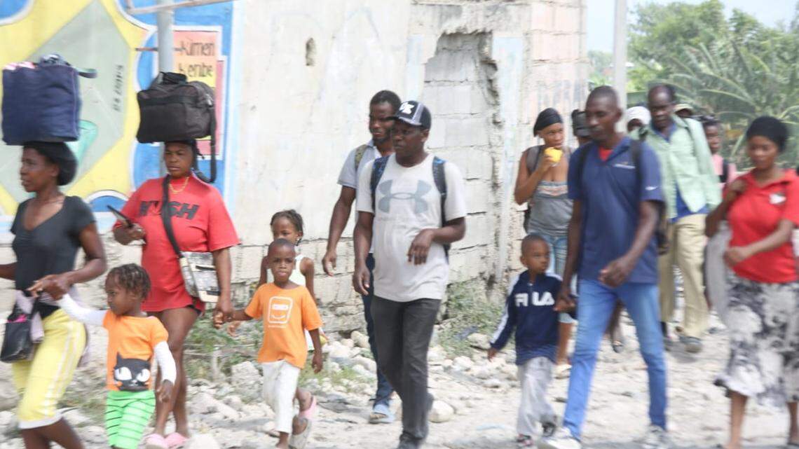 Fresh gang attacks frustrate Haiti businesses, hit charity hospital as residents flee