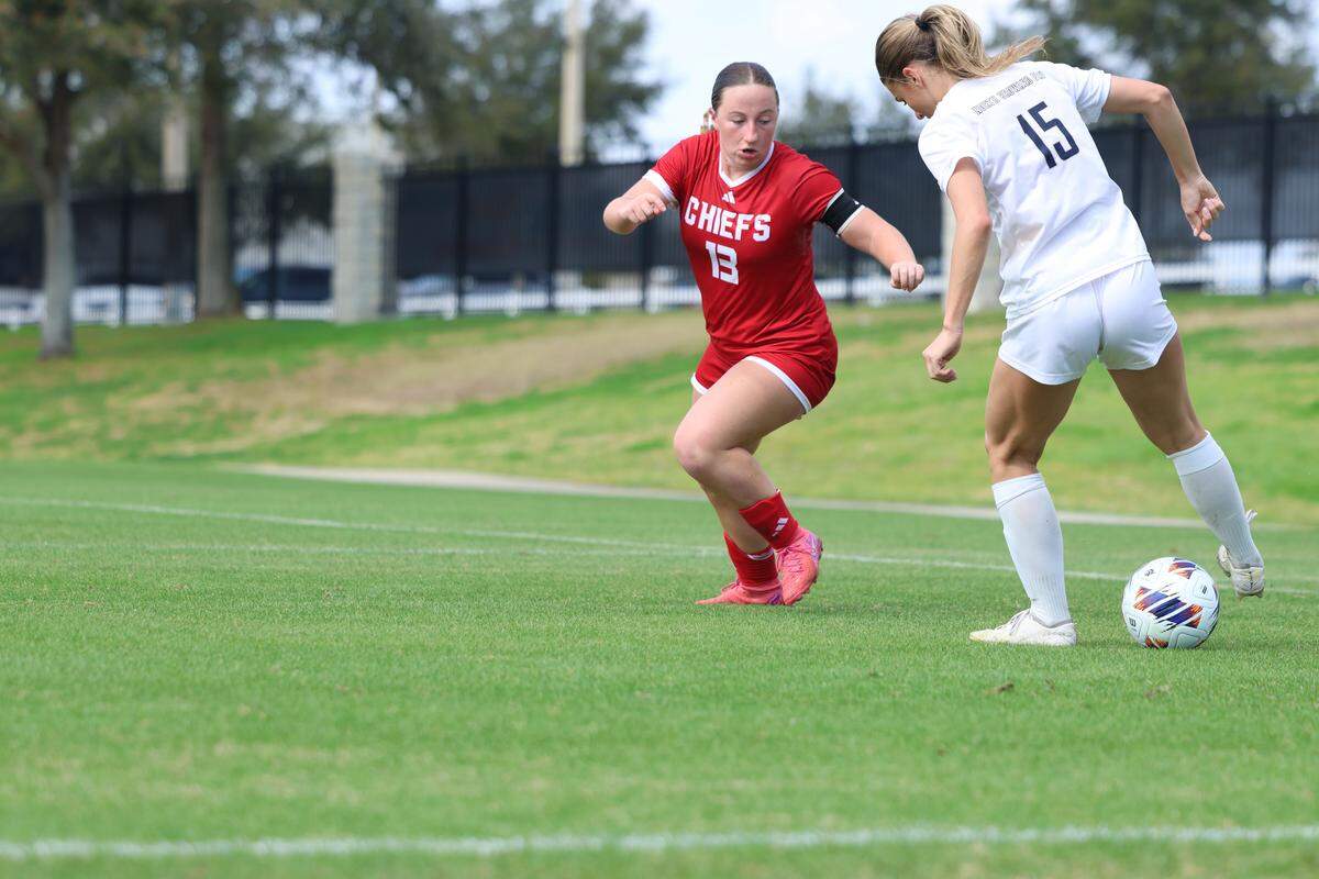 North Broward Prep’s Ella Munoz (right) and Cardinal Gibbons’ Caroline Findley (left) duel for possession during Thursday’s Class 3A state semifinal at Lake Myrtle Sports Complex in Auburndale, Fla.