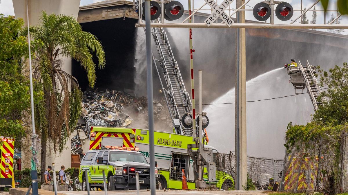 Several Miami-Dade Firefighters units battled a large fire at the Ferrous Processing and Trading scrap metal facility located at 3700 NW North River Drive, in Miami, on Thursday April 10, 2025.