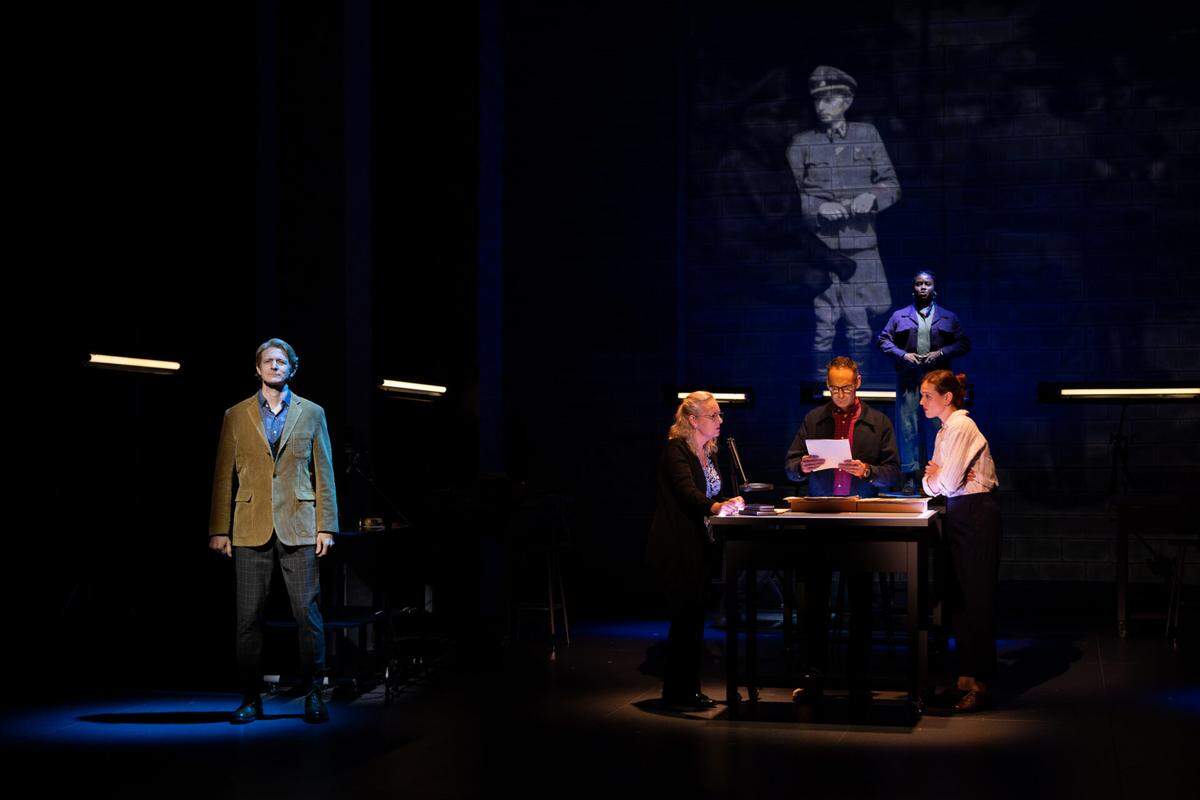 The ensemble plays multiple roles in “Here There Are Blueberries,” a story about a museum obtaining a scrapbook of Nazi officers’ day to day living.