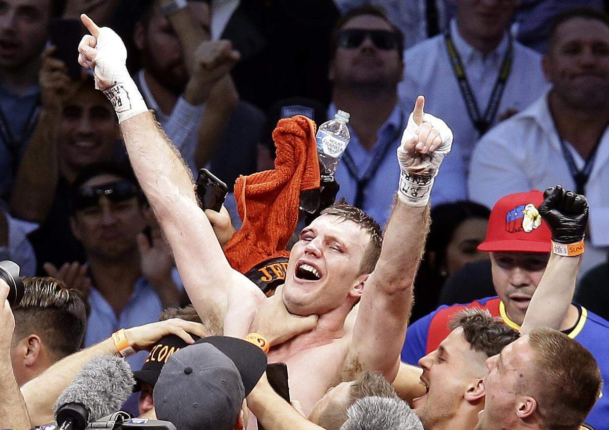 Jeff Horn of Australia celebrates after beating Manny Pacquiao of the Philippines during their WBO World Welterweight title fight in Brisbane, Australia, Sunday, July 2, 2017. Pacquiao lost his WBO welterweight world title to Horn in a stunning, unanimous points decision in a Sunday afternoon bout billed as the Battle of Brisbane in front of more than 50,000 people. (AP Photo/Tertius Pickard)