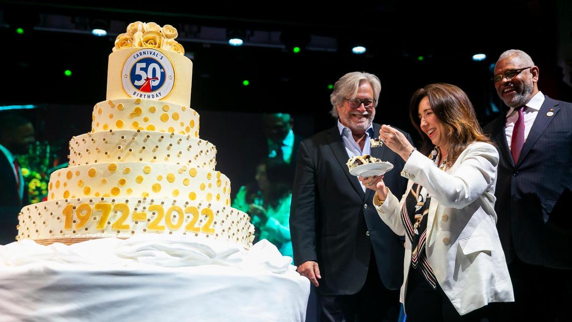 Carnival executives, from left, Micky Arison, Christine Duffy and Arnold Donald celebrate Carnival’s 50th birthday aboard the Carnival Conquest docked at PortMiami on Friday, March 11, 2022.
