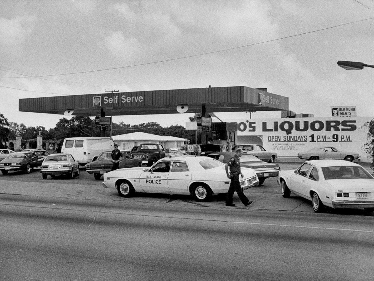 In 1979, West Miami police cars and officers controlling traffic on Southwest Eighth Street ad 57th Avenue.