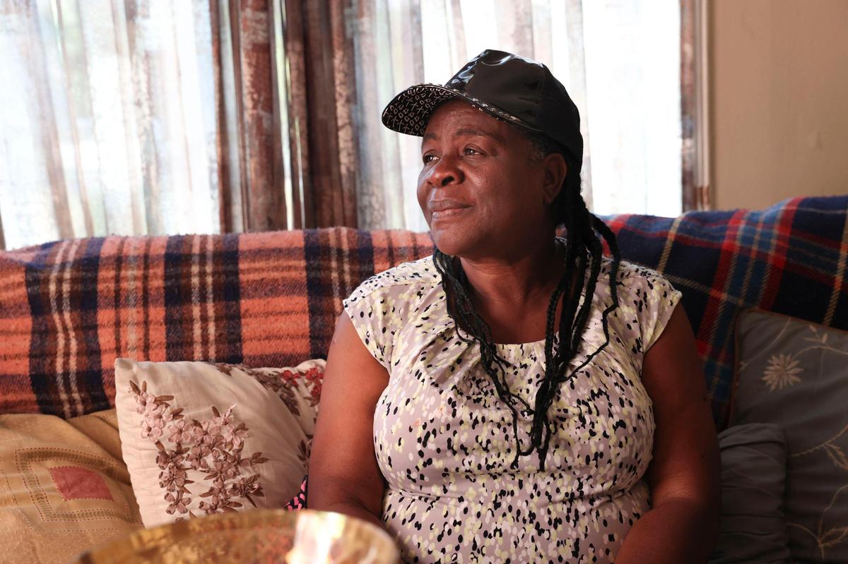 Marie Honor, who immigrated from Haiti, sits in her rental home in North Miami on Tuesday, May 17, 2022. She’s struggling to find a new place to rent after her landlord sent her a 60-day notice to vacate the property.