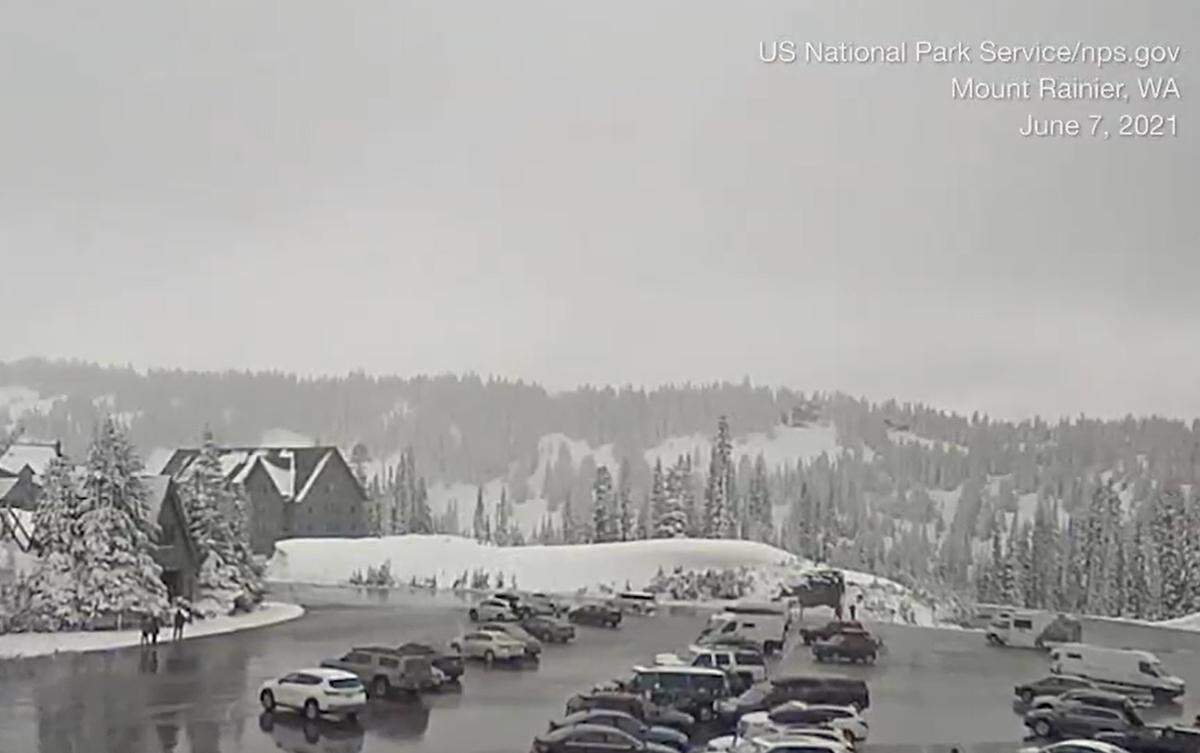 Snow covers Mount Rainier near Seattle on June 7, 2021, in this Weather Channel video screen grab image.