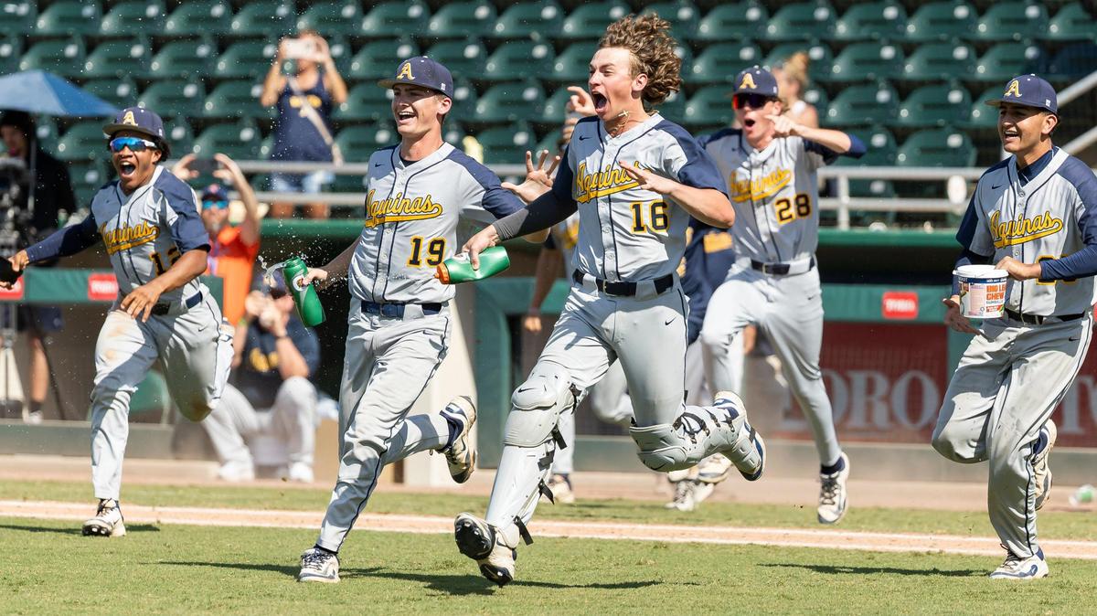St. Thomas Aquinas Raiders run onto the field after defeating the Buchholz Bobcats in their Class 6A state baseball championship game at Hammond Stadium on Saturday, May 17, 2025, in Fort Myers, Fla.