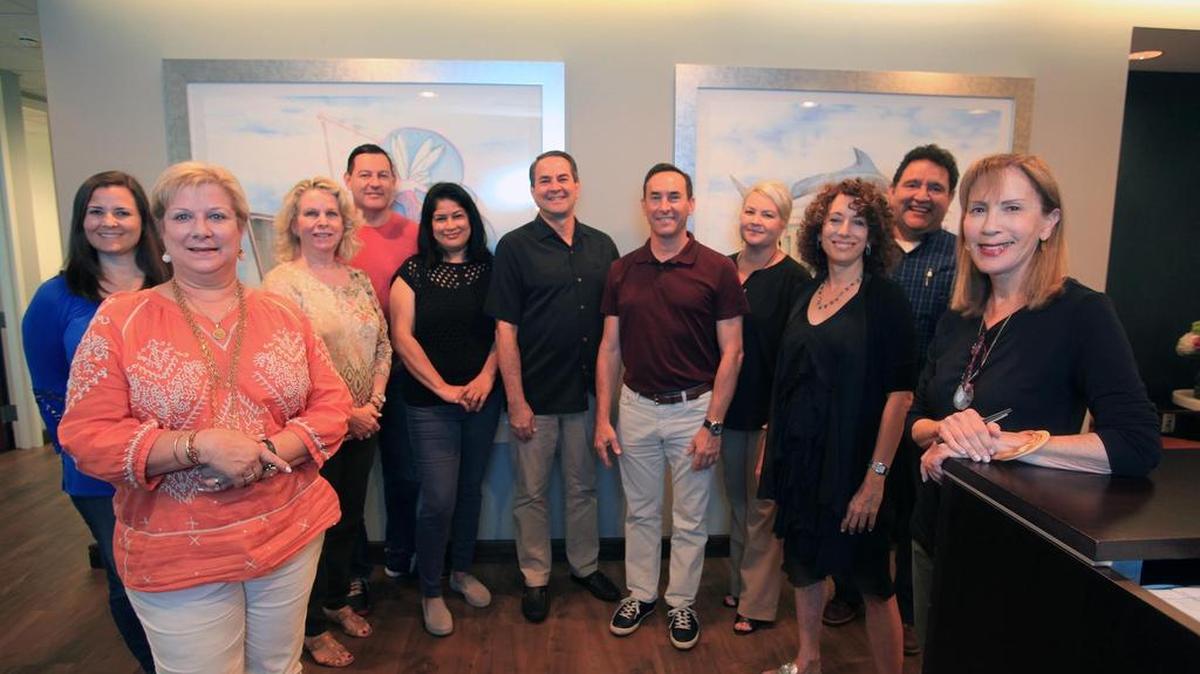 Executives and other personnel of The Parker Company, at the company headquarters at 6205 Blue Lagoon Dr., Suite 300, in Miami.