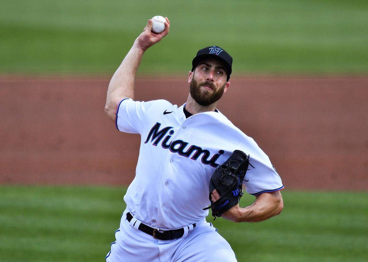 Anthony Bass #52 of the Miami Marlins delivers a pitch in the third inning against the New York Mets in a spring training game at Roger Dean Chevrolet Stadium on March 01, 2021 in Jupiter, Florida.