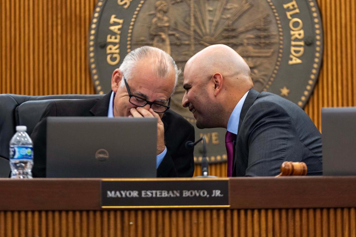 Hialeah Mayor Esteban Bovo, left, speaks with City Council President Jesus Tundidor, during a city council meeting at Hialeah City Hall on Nov. 12, 2024, in Hialeah.