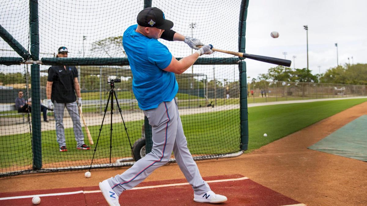 Miami Marlins first baseman Garrett Cooper bats during batting practice in their spring training workout at Roger Dean Stadium on Tuesday, March 15, 2022 in Jupiter, FL.