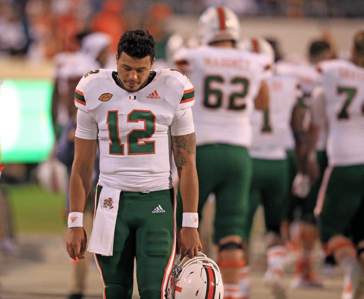 Miami Hurricanes quarterback Malik Rosier (12) in the final seconds of the game as the University of Miami Hurricanes visit the Virginia Cavaliers at Scott Stadium in Charlottesville, VA on Saturday, October 13, 2018.