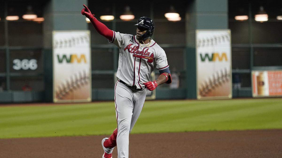 Atlanta Braves’ Jorge Soler celebrates a three-run home run during the third inning in Game 6 of baseball’s World Series between the Houston Astros and the Atlanta Braves Tuesday, Nov. 2, 2021, in Houston. (AP Photo/Eric Gay)