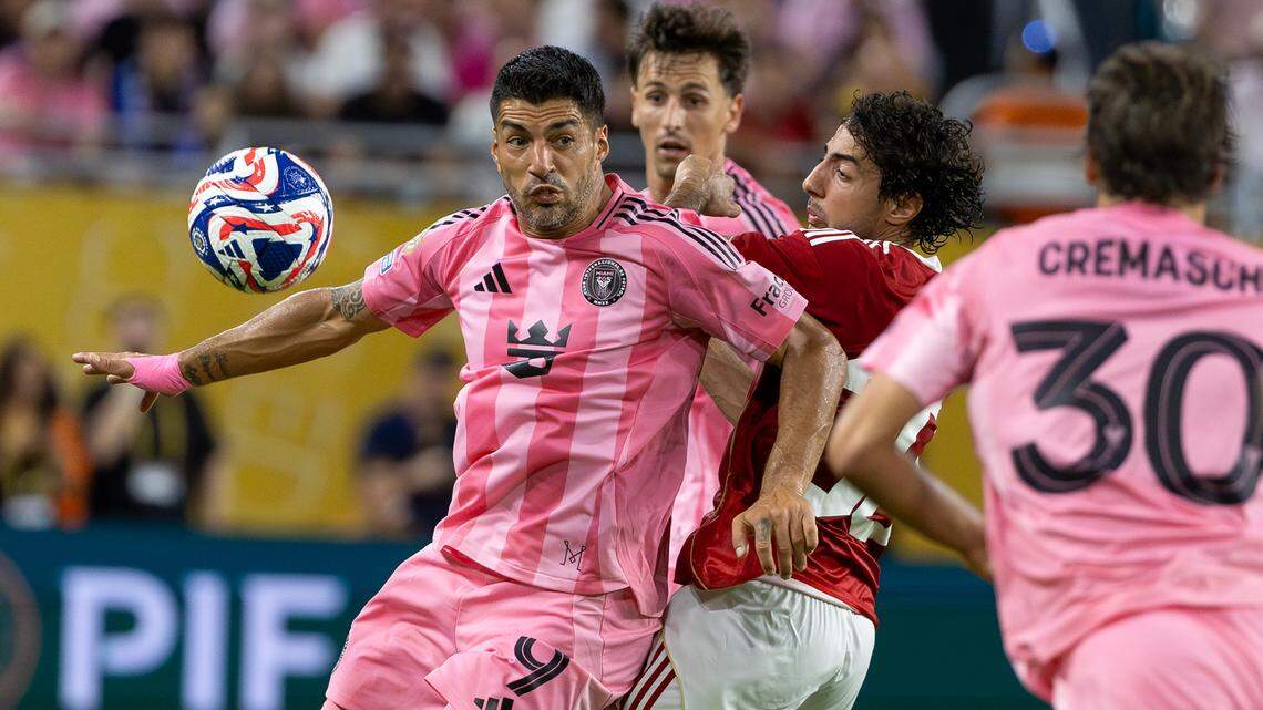 Inter Miami forward Luis Suárez (9) fights for possession with Al Ahly defender Mohamed Hany (30) during the second half of their Group A first-round FIFA Club World Cup match at Hard Rock Stadium on Saturday, June 14, 2025, in Miami Gardens, Fla.