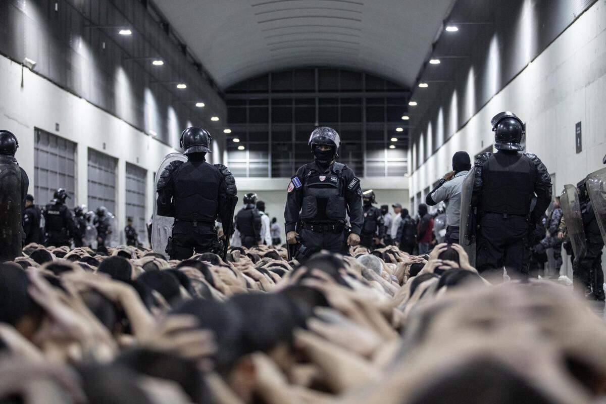 This photo, released by the Presidencia El Salvador, shows a second group of 2,000 detainees being transferred overnight to the Terrorist Confinement Centre (CECOT) in Tecoluca, El Salvador, on March 15, 2023.