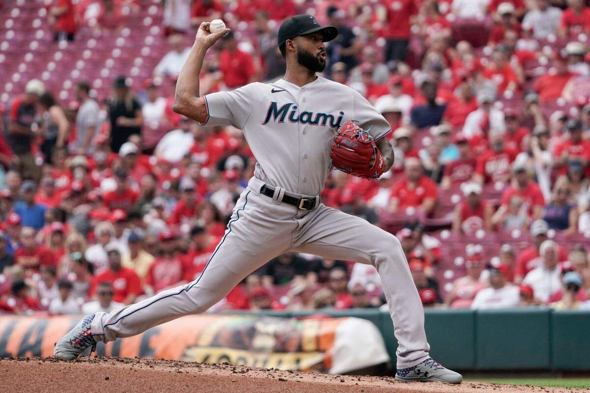 Miami Marlins starting pitcher Sandy Alcantara throws during the first inning of a baseball game against the Cincinnati Reds, Sunday, Aug. 22, 2021, in Cincinnati. (AP Photo/Jeff Dean)