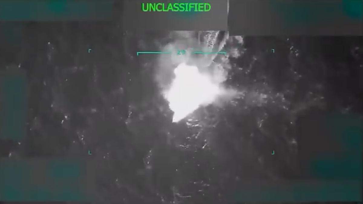 A U.S. military video released by the Department of Defense shows a precision strike destroying a high-speed narcotics vessel in international waters on Sept. 2, 2025. The footage, later shared by Trump on Truth Social, was described as targeting the Tren de Aragua criminal organization amid a U.S. naval buildup in the Caribbean.