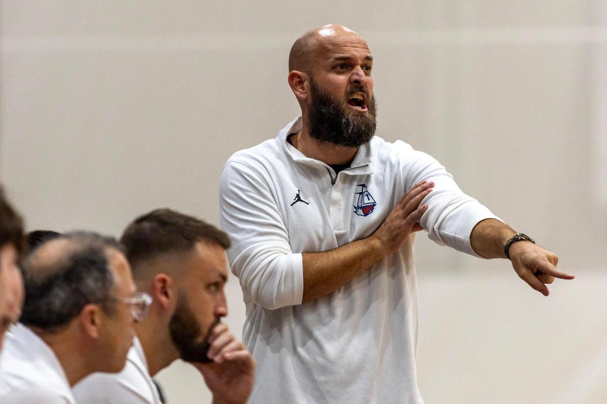 Columbus Head Coach Andrew Moran shouts instructions to players during the second half of the GMAC Basketball Finals at Miami-Dade Kendall campus gym in Miami, Florida on Saturday, January 27, 2024.