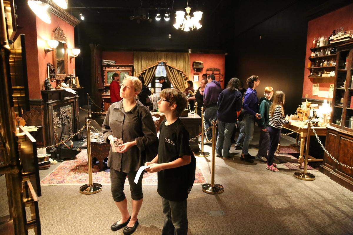 Frost Museum visitors check out “Sherlock Holmes: The Exhibit,” now on display.