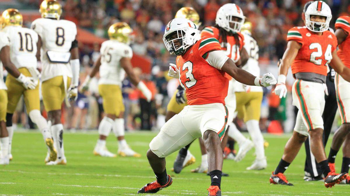 Miami Hurricanes DeeJay Dallas (13) reacts ofter taking down Notre Dame Fighting Irish wide receiver Chris Finke (10) on a punt return in the first quarter as the University of Miami Hurricanes host Notre Dame Fighting Irish at Hard Rock Stadium on Saturday, November 11, 2017.