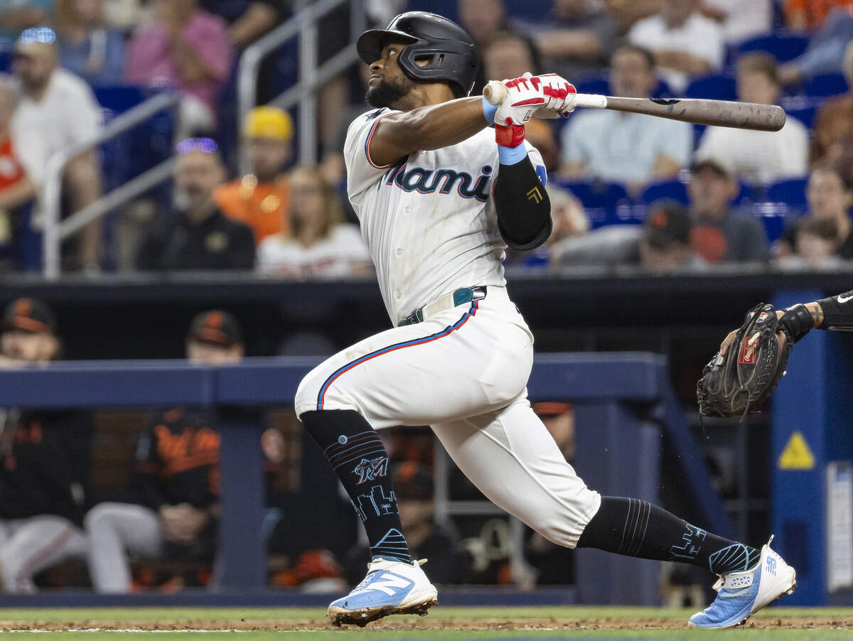 Miami Marlins shortstop Otto Lopez (6) hits a single against the Baltimore Orioles in the third inning of their MLB game at loanDepot park on Thursday, May 7, 2026, in Miami, Fla.