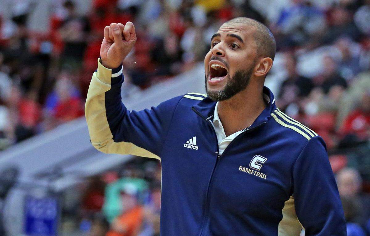 Calvary Christian Academy head coach Cilk McSweeney calls out to players during game against Lake Highland Prep in Class 4A boys basketball semifinal at the RP Funding Center in Lakeland on Thursday, March 3, 2022.