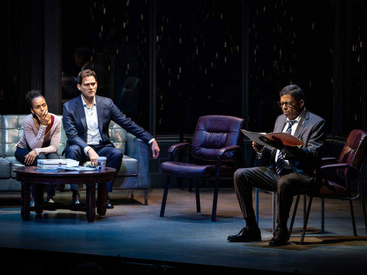 Kerry Washington’s Kendra and Steven Pasquale’s Scott listen as Eugene Lee’s Lt.  Stokes tells them what the police know about their missing son in Christopher Demos-Brown’s “American Son.”
