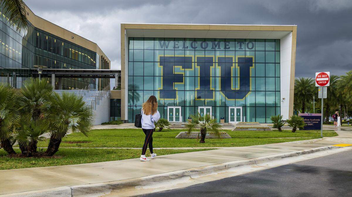 Students walk by at Florida International University, in Miami, on Tuesday, April 07, 2026.