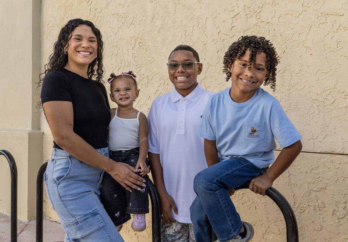 Antonia Kincannon and her children -from left- Xaria, Jasiah and Isaias, posed in Kendall, on Saturday, December 20, 2025.