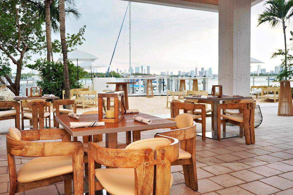 The outdoor dining area at Pamplemousse on the Bay in Miami Beach.
