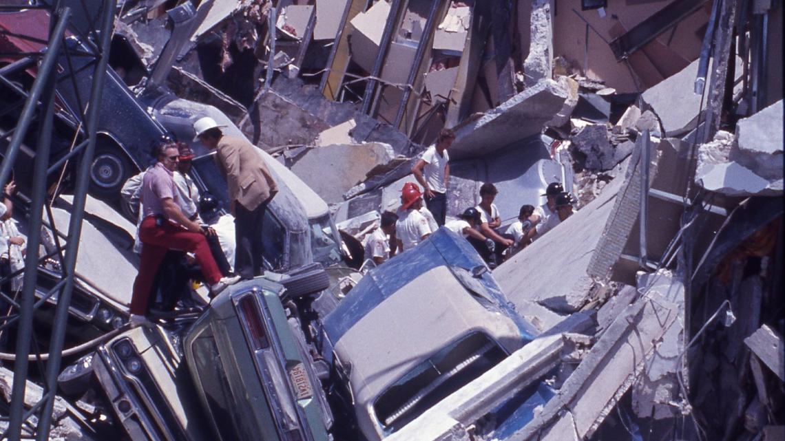Rescuers work amid tangled metal and topsy-turvy automobiles after the collapse of Miami’s Drug Enforcement Administration building at Northeast 12th Street and Second Avenue, which caved in at 10:23 a.m. on Aug. 5, 1974. Seven people died in the collapse.