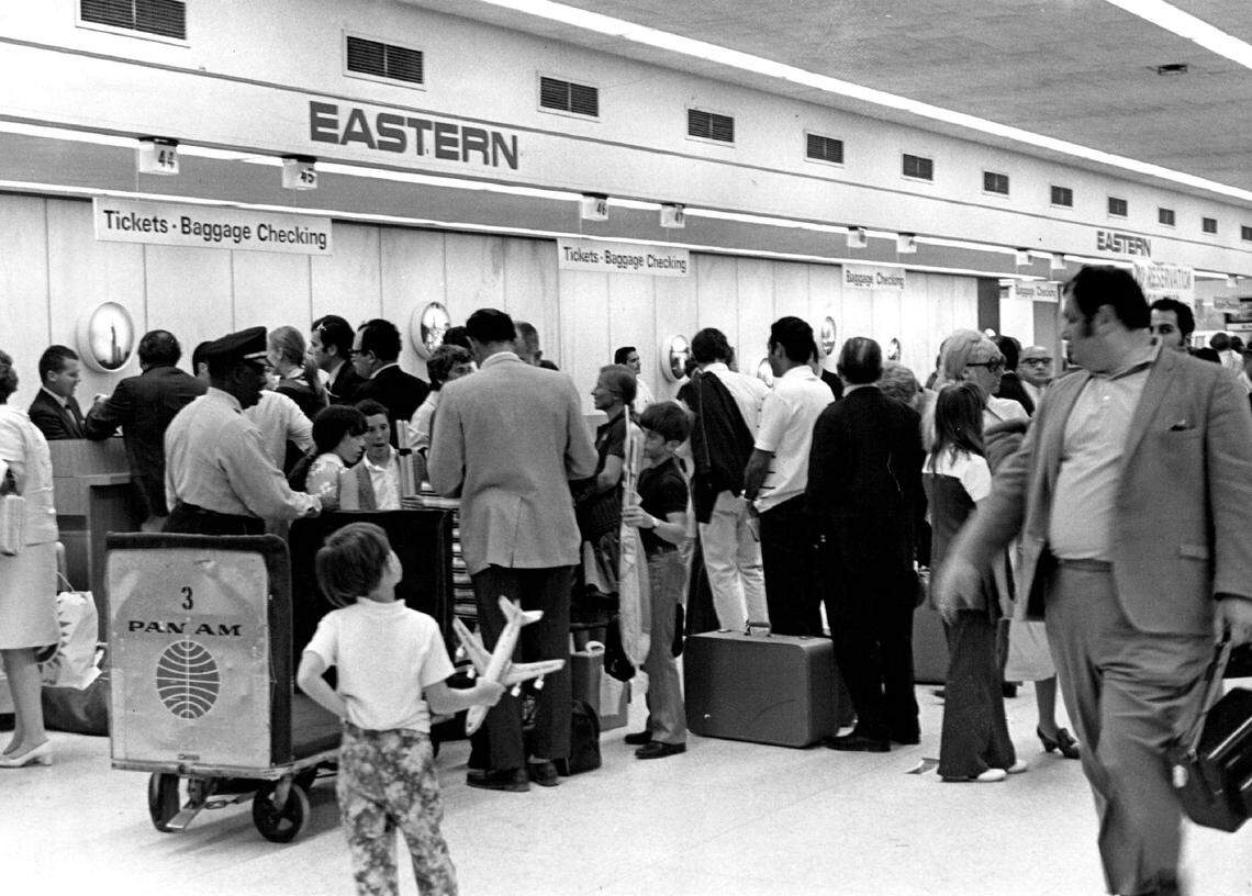 In March 1970, crowds gather at the Eastern Airlines desk in Miami.