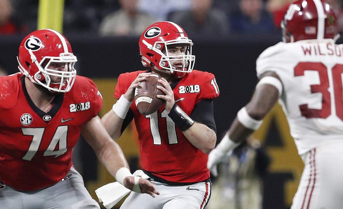 Georgia quarterback Jake Fromm throws during the first half of the NCAA college football playoff championship game against Alabama Monday, Jan. 8, 2018, in Atlanta. (AP Photo/David Goldman)