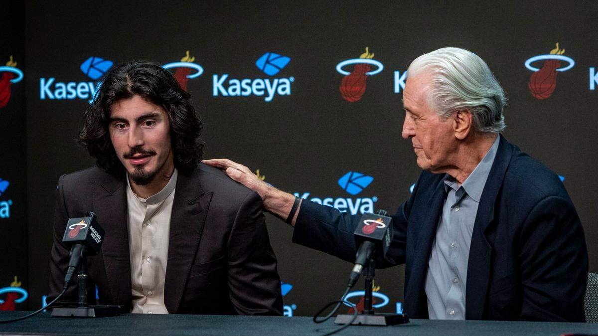 The Miami Heat’s first-round draft pick Jaime Jaquez, Jr., left, and Miami Heat President Pat Riley talk to reporters during a press conference at Kaseya Center.