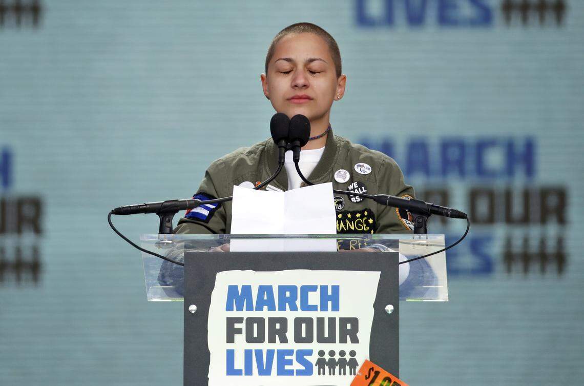 Emma Gonzalez, a survivor of the mass shooting at Marjory Stoneman Douglas High School in Parkland, Fla., closes her eyes and cries as she stands silently at the podium for the amount of time it took the Parkland shooter to go on his killing spree during the "March for Our Lives" rally in support of gun control in Washington on Saturday, March 24, 2018.