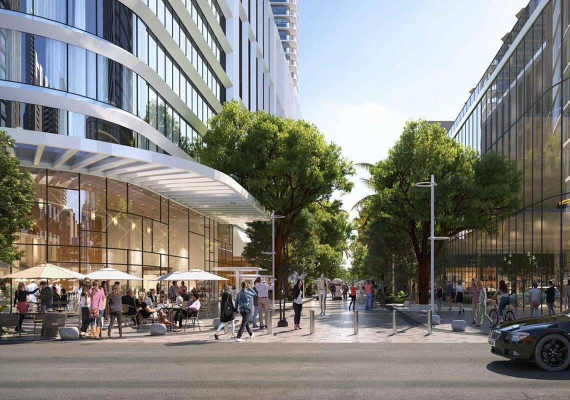 A rendering of the development being proposed by Braman Motors shows a pedestrian walkway.