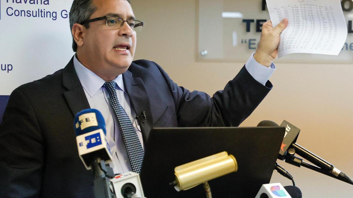 Emilio Morales, vice-president of RevoluGROUP USA Inc., speaks about RevoluPAY, a money app that will allow Cuban Americans to send remittances to their relatives in Cuba, at the International Humboldt University in Miami Tuesday, March 8, 2022.