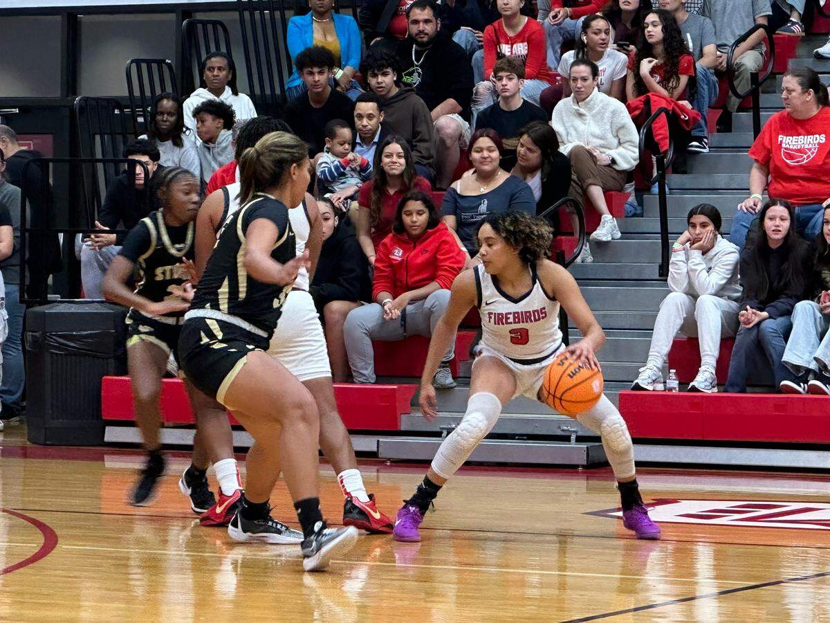 Doral Academy guard Victoria Valle looks for an opening to the rim during Friday’s Region 4-7A championship game at Doral.