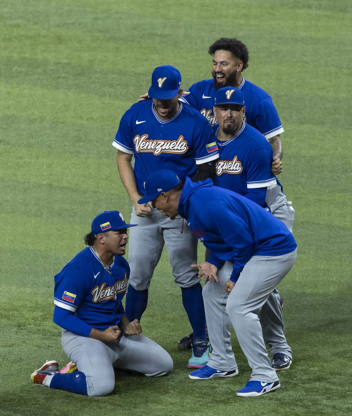 Venezuela pitcher Daniel Palencia (29) celebrates with teammates after defeating the United States in their World Baseball Classic final game at loanDepot Park on Tuesday, March 17, 2026, in Miami, Fla.